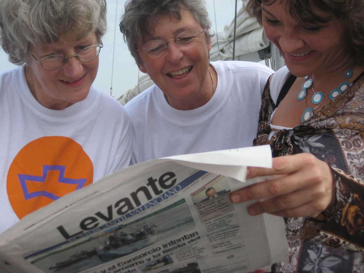 Gunilla, Myra, and Vera read favorable news coverage