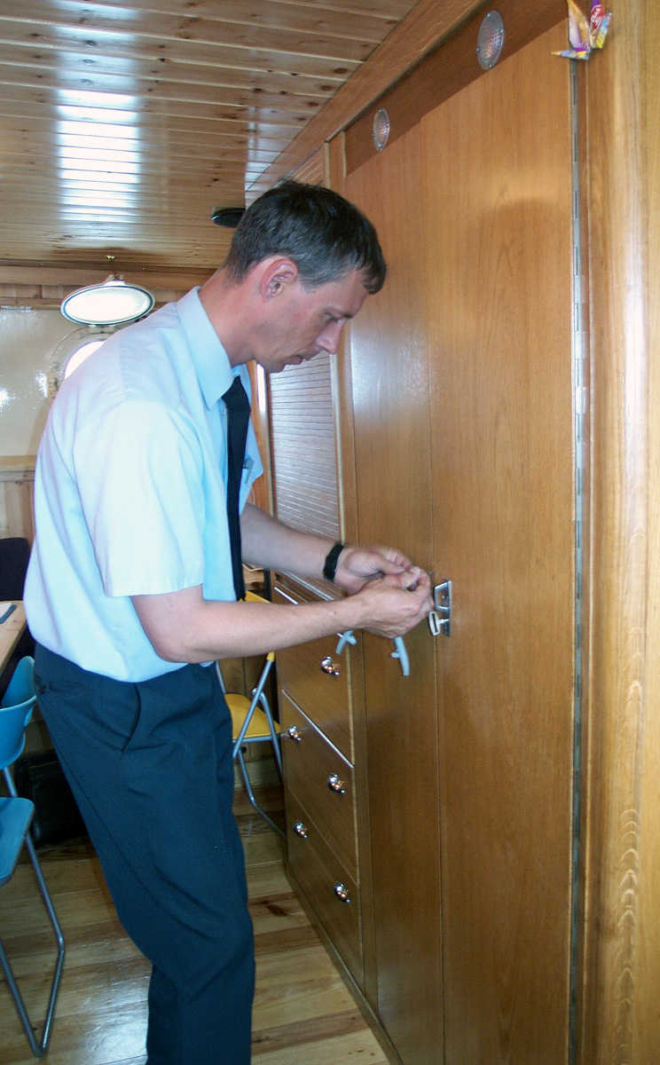 Custom officers checking the sealed closet