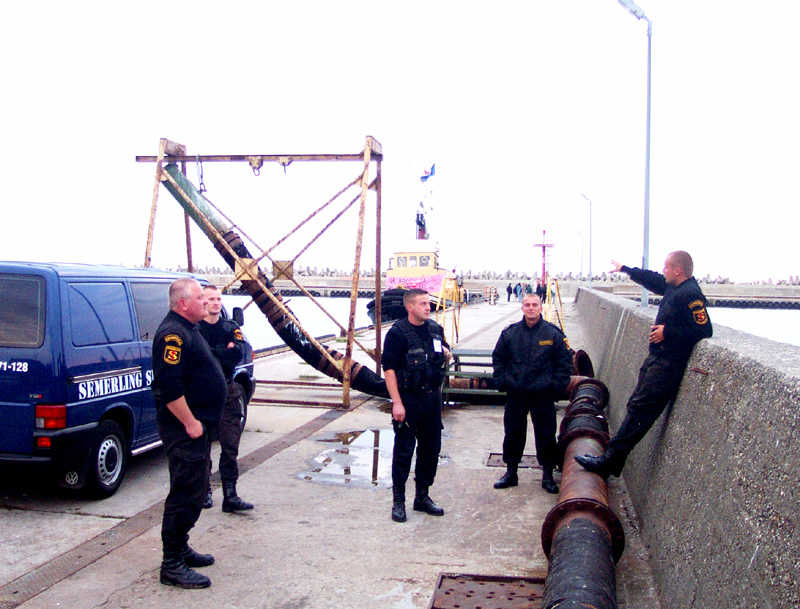 security men waiting to pick up the women