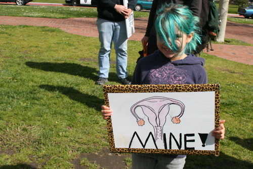 Girl-with-Reproductive-Rights-Sign-feminism-23028976-500-333.jpg