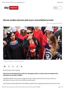Women swallow abortion pills at pro-choice Belfast protest.pdf